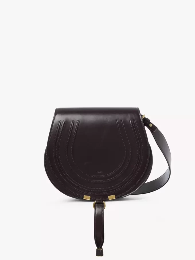 Sacoche de selle Marcie en cuir brillant Sacoche de selle Marcie en cuir brillant
