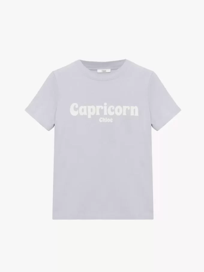 T-shirt bébé Capricorne en jersey de coton T-shirt bébé Capricorne en jersey de coton