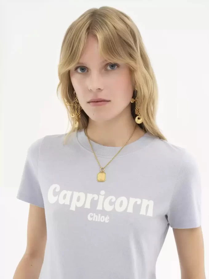 T-shirt bébé Capricorne en jersey de coton T-shirt bébé Capricorne en jersey de coton