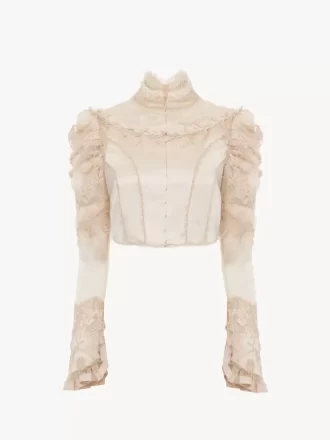 Veste courte ajustée en satin duchesse de soie et dentelle